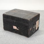 A 19th century stained pine and metal bound trunk,