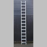 An aluminium extending ladder,