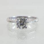 An unmarked diamond square set ring, approximately 1.