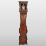 A 19th century French walnut cased longcase clock, of large proportions, with a shaped case,