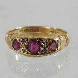 An 18 carat gold ruby and diamond ring