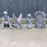 A bronze effect garden figure of a fairy, together with three others,