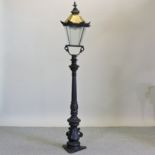 A Victorian style black painted metal lamp post,