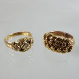 An 18 carat gold rope twist ring, together with another set with diamonds,