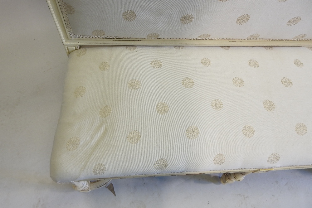 A French style cream upholstered high back sofa, on turned legs, united by shaped stretchers, - Image 7 of 9