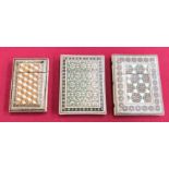 Three 19th century Eastern decorated card cases