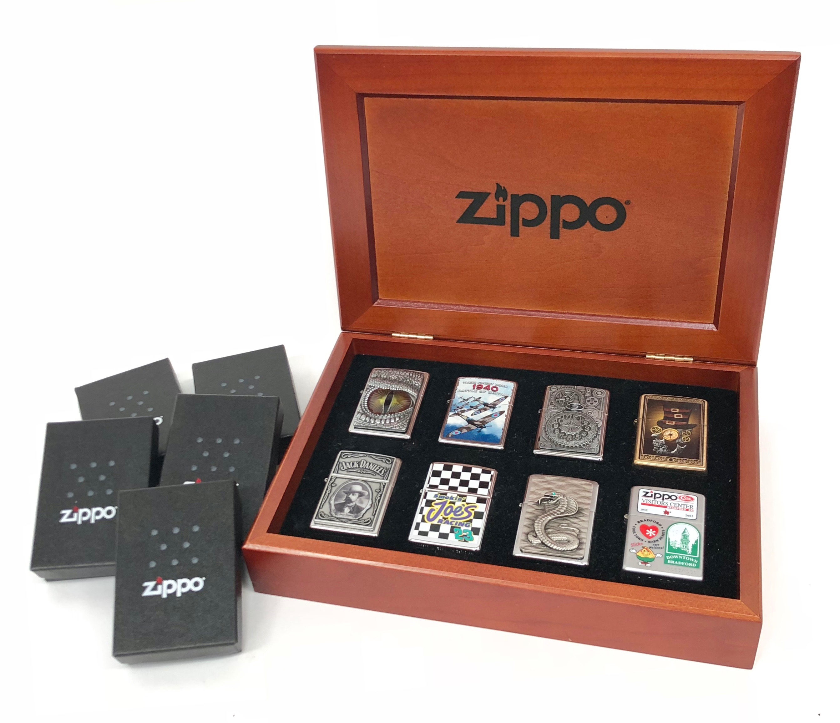 Six Collectors Zippo Cigarette Lighters.