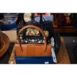 A quantity of vintage handbags to include a lizard skin bag, needlepoint bag with decoration and a