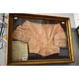 A gilt cased Victorian pink silk bodice with letter of provenance enclosed ref. Mary Ann Gwyer of