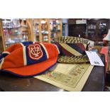 A local boy's school cap and his Baptism certificate plus a man's straw boater (3)