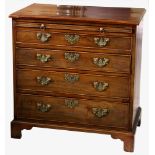 A good George III mahogany bachelor's chest, the moulded top over a brushing slide and four