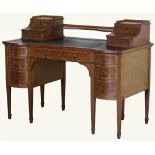 An Edwards & Roberts fiddleback mahogany and marquetry desk, of bowed breakfront outline, banded