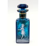 A turquoise blue glass scent bottle, in the style of Mary Gregory, white enamel decoration of a