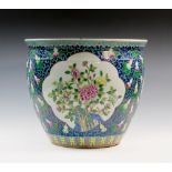 A large and fine quality large 19th century cobalt blue ground Chinese famille rose-verte moulded