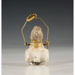 A Chinese carved rock crystal miniature scent bottle, early 20th century, the rectangular body