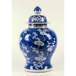 A Chinese blue and white 19th century porcelain lidded jar, baluster form, decorated with