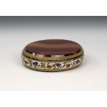 A French 19th century gilt metal, champleve enamel and agate box, oval, the enamelled sides with
