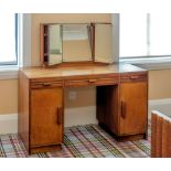 A good quality 1930s Art Deco red walnut and ash dressing table, the plain rectangular top with