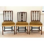 A pair of George III ash side chairs, the rectangular backs with flared bars centred with ovals,
