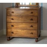 A mid-19th century mahogany chest of drawers, the plain top over four long graduated drawers with