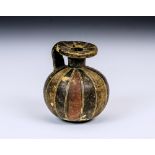 A Greek Protocorinthian Aryballos, circa 640-625 B.C. wide everted rim with narrow neck over lightly