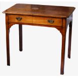An early George III fruitwood side table, the well figured moulded top with everted corners, over