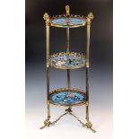 A French gilt metal and Japanese cloisonné three tier etagere, c.1900, the three circular tiers with