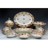 An early 19th century Derby porcelain part dinner service, iron red painted factory marks, painted