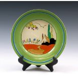 A Clarice Cliff Tulips pattern circular plate, circa 1934, hand painted with stylized cottage