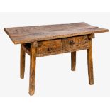 A 17th / 18th century Spanish joined carved walnut side table, the one piece rectangular top over