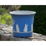 A 19th century blue jasperware jardinière, probably Wedgwood, cylindrical form with everted rim,