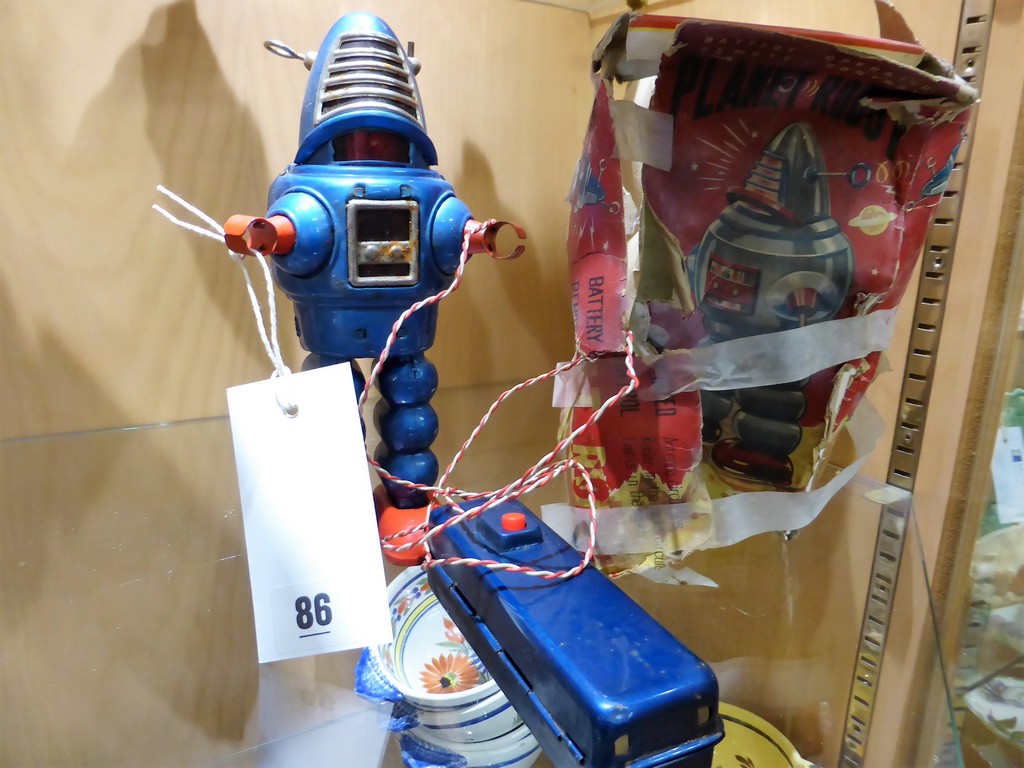 A 1960 Yoshiya Japan battery operated, remote control 'Planet Robot' (battery terminal in good