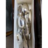 A quantity of silver bright cut fiddle pattern teaspoons & a pair of sugar tongs - shooting interest