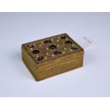 A Continental gilt metal trinket box, c.1900, of rectangular form, the hinged lid inset with semi-