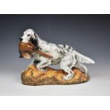 A Royal Doulton English Setter with pheasant in mouth figurine, HN. 2529, 8¬in. (21cm.) high.