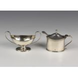 A George V boat form twin handled salt, London 1922, with reeded rim and handles, on an oval