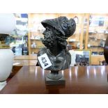 A small patinated bronze bust of a Greek warrior