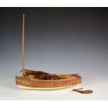 Diajon - A late 19th/early 20th century clinker built model pond yacht / dinghy, a/f.