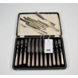 A cased silver dessert set, comprising of six forks & knives, the blades stainless, together with