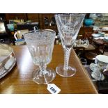 A Victorian cut glass goblet (chip to foot) and a flute engraved 'York AD71-1971'. (2)