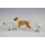 A Beswick boxer dog, together with Lladro polar bear & duck figurines. (3)