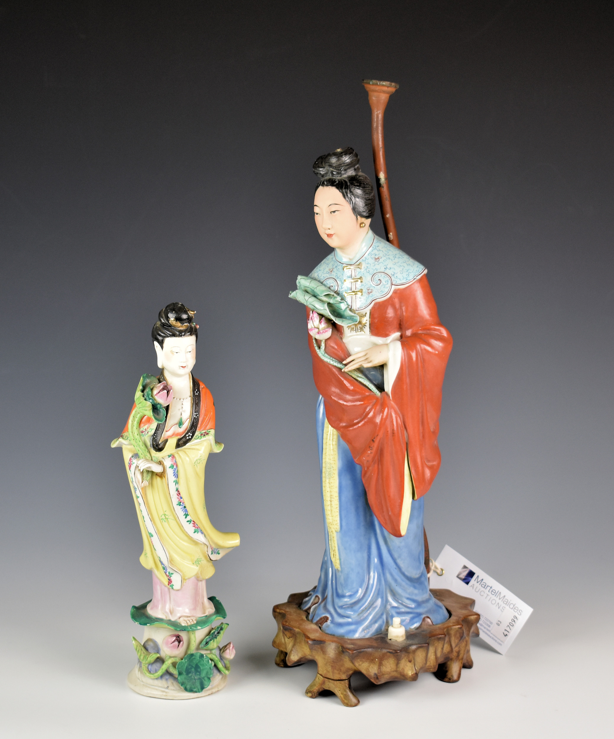 Two Chinese porcelain figures of Guanyin, second quarter 20th century, one with orange and yellow