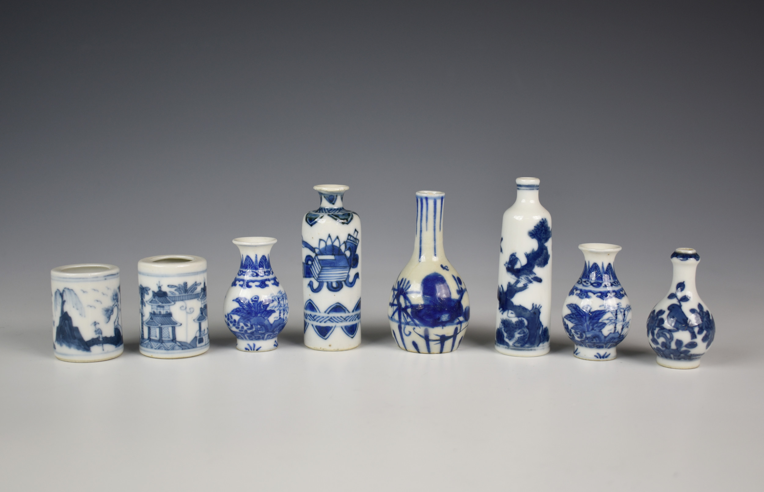 A collection of eight Chinese miniature vases, possibly Kangxi period, to include a variety of