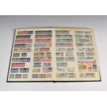 An album containing mid-century & earlier Great Britain stamps.