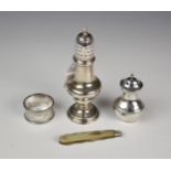 A small collection of silver smalls, to include a Georgian pepper caster, John Lambe, London, date