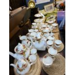 An extentive Royal Albert ' Old Country Rose ' tea & coffee servicesix setting to include teapots,