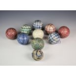 A collection of ten Scottish pottery carpet bowls, of spherical form, including four sponge