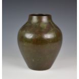 A 1930s WMF bronze vase, of tapered ovoid form, with mid-brown patination and etched stylised