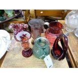 Two 1960s art glass vasestogether with a cranberry glass jug; a crackle glass vase; and three