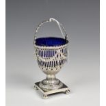 A George III silver swing handled sugar basket, John Roberts & Co., Sheffield 1775, in the Adam